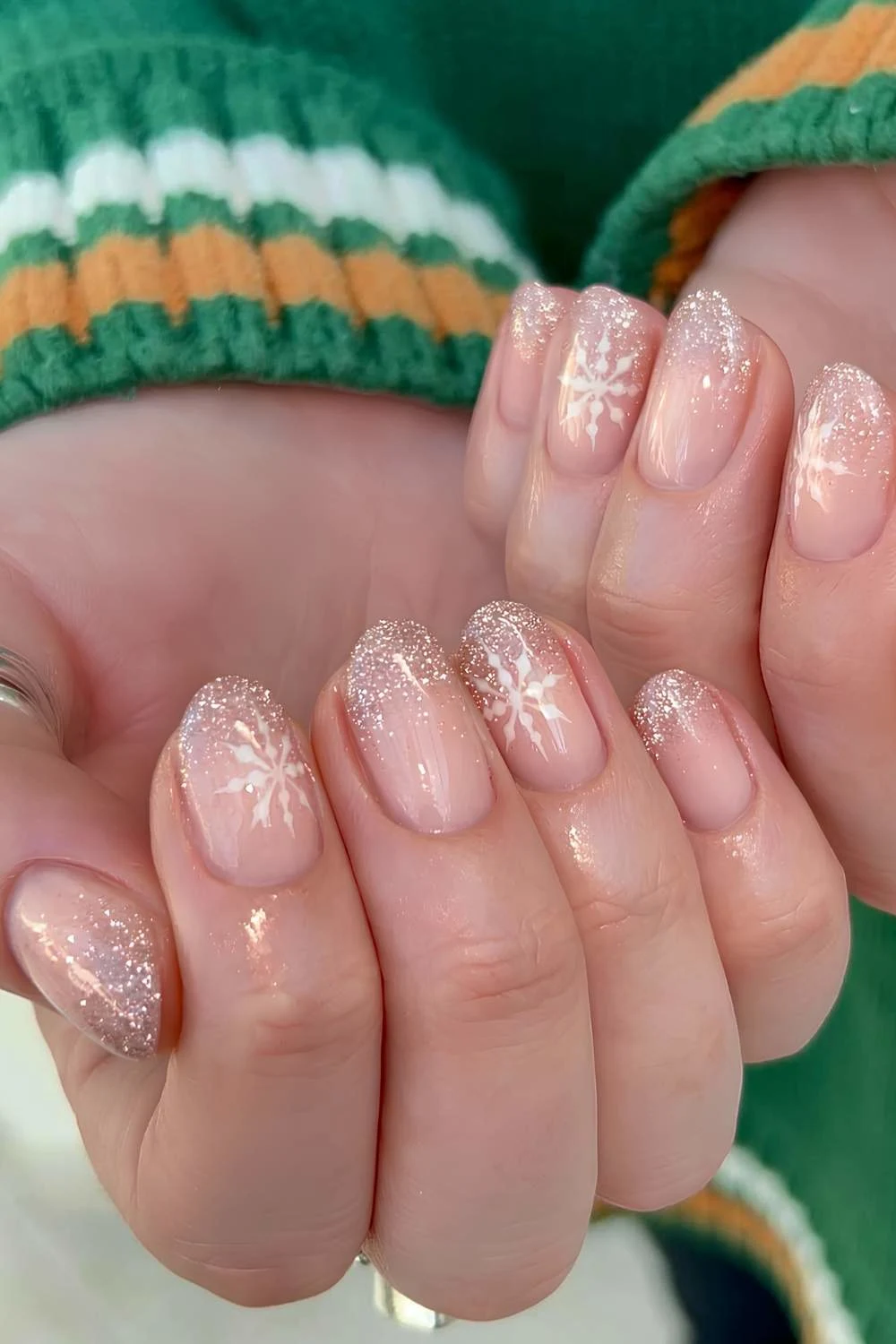 Short gold ombre nails with snowflakes