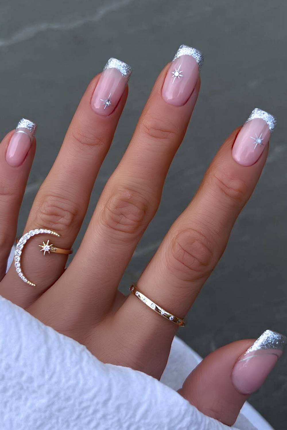 Silver French nails with stars and gems