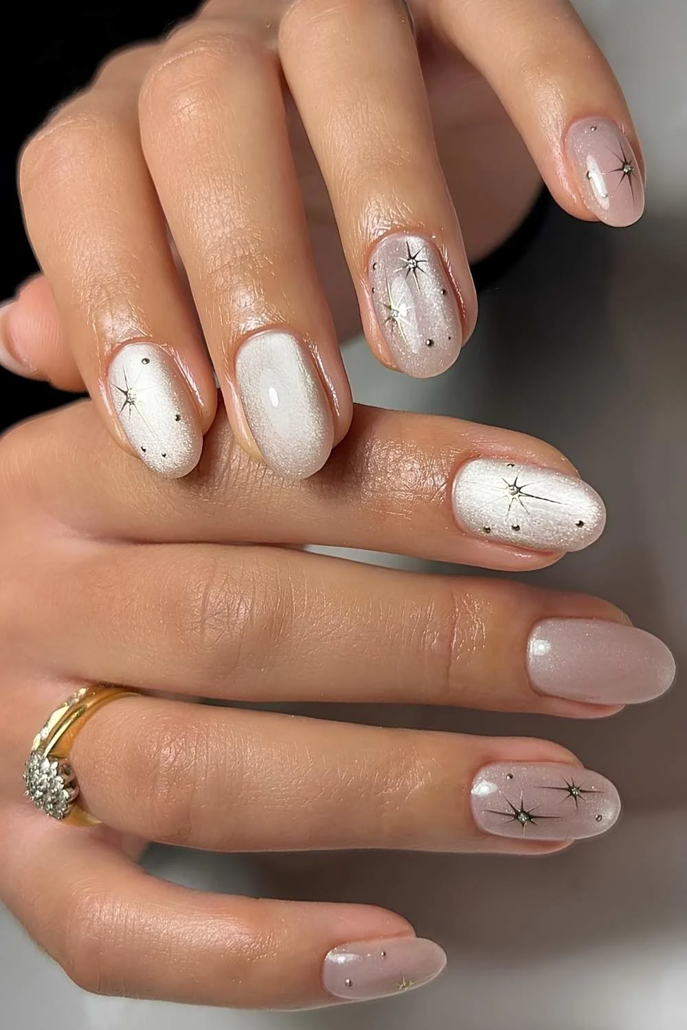 Silver cat eye nails with celestial art