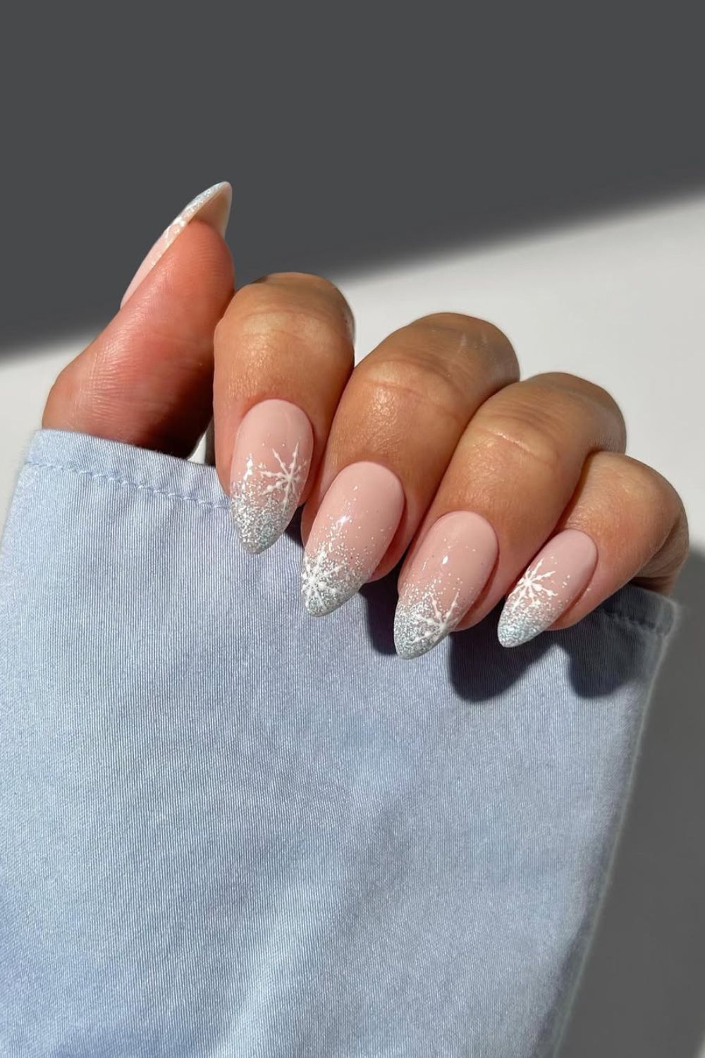 Silver glitter French tip nails with snowflakes