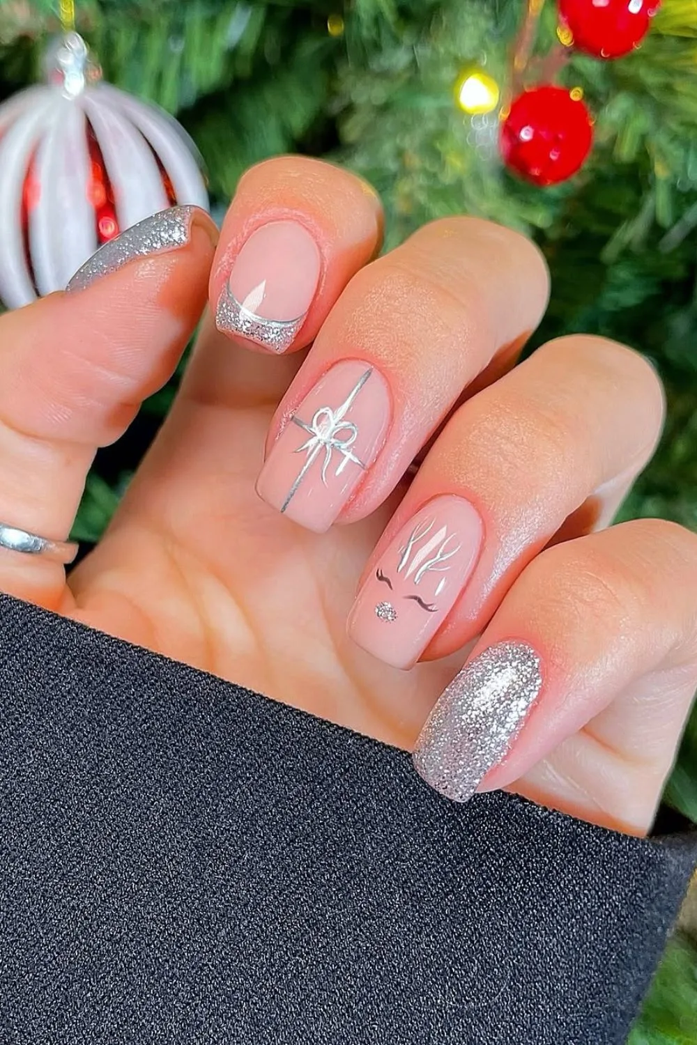 Silver nails with reindeer design