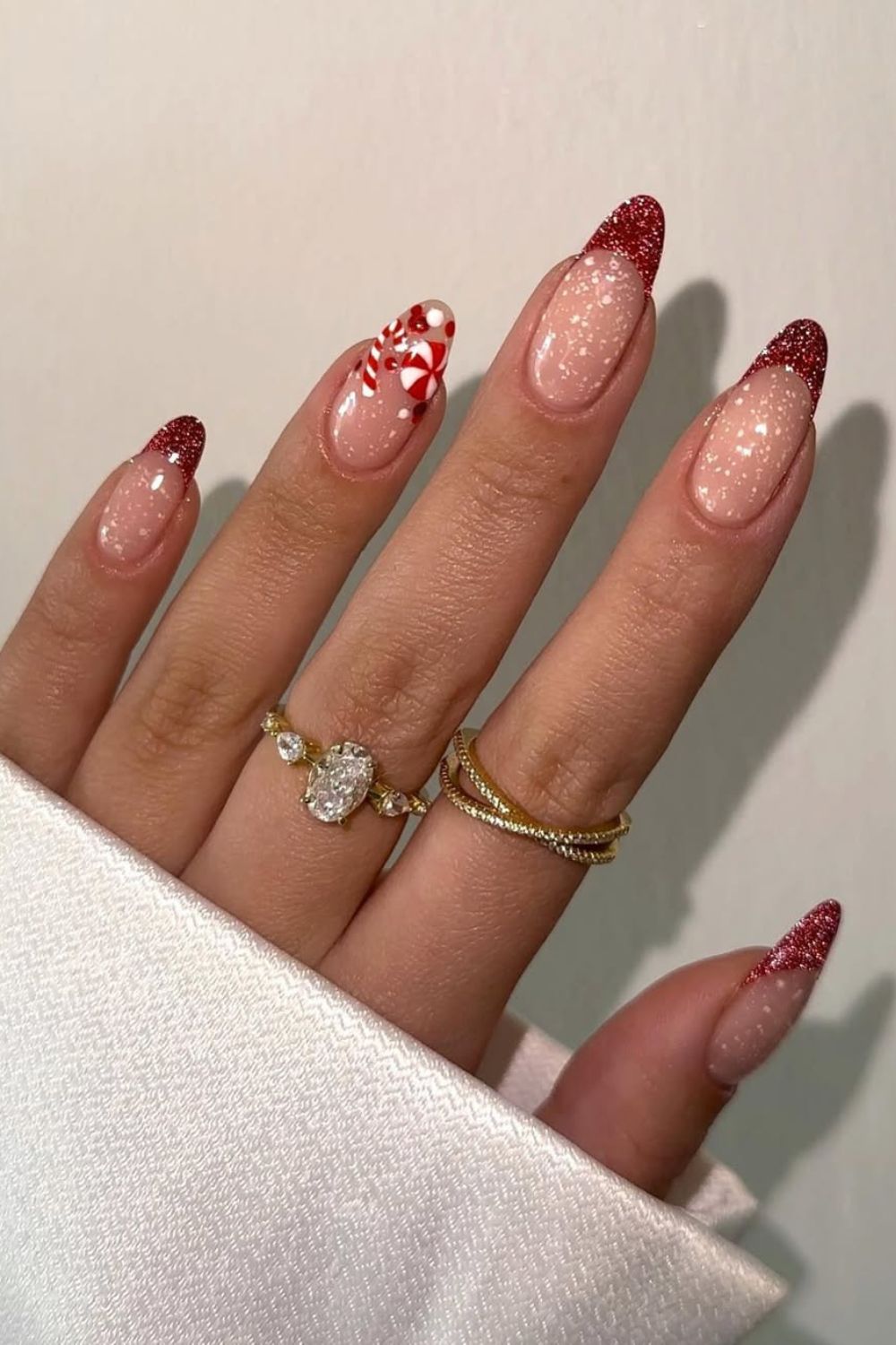 Snowy Red French tip nails with candy cane accents