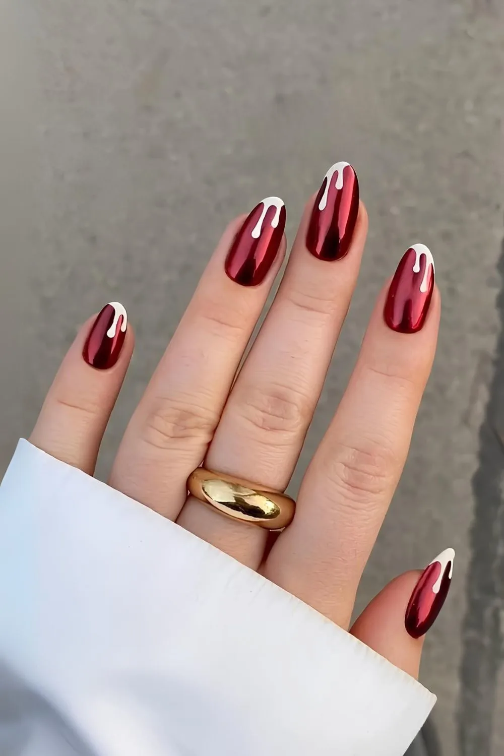 Snowy red chrome Christmas nails