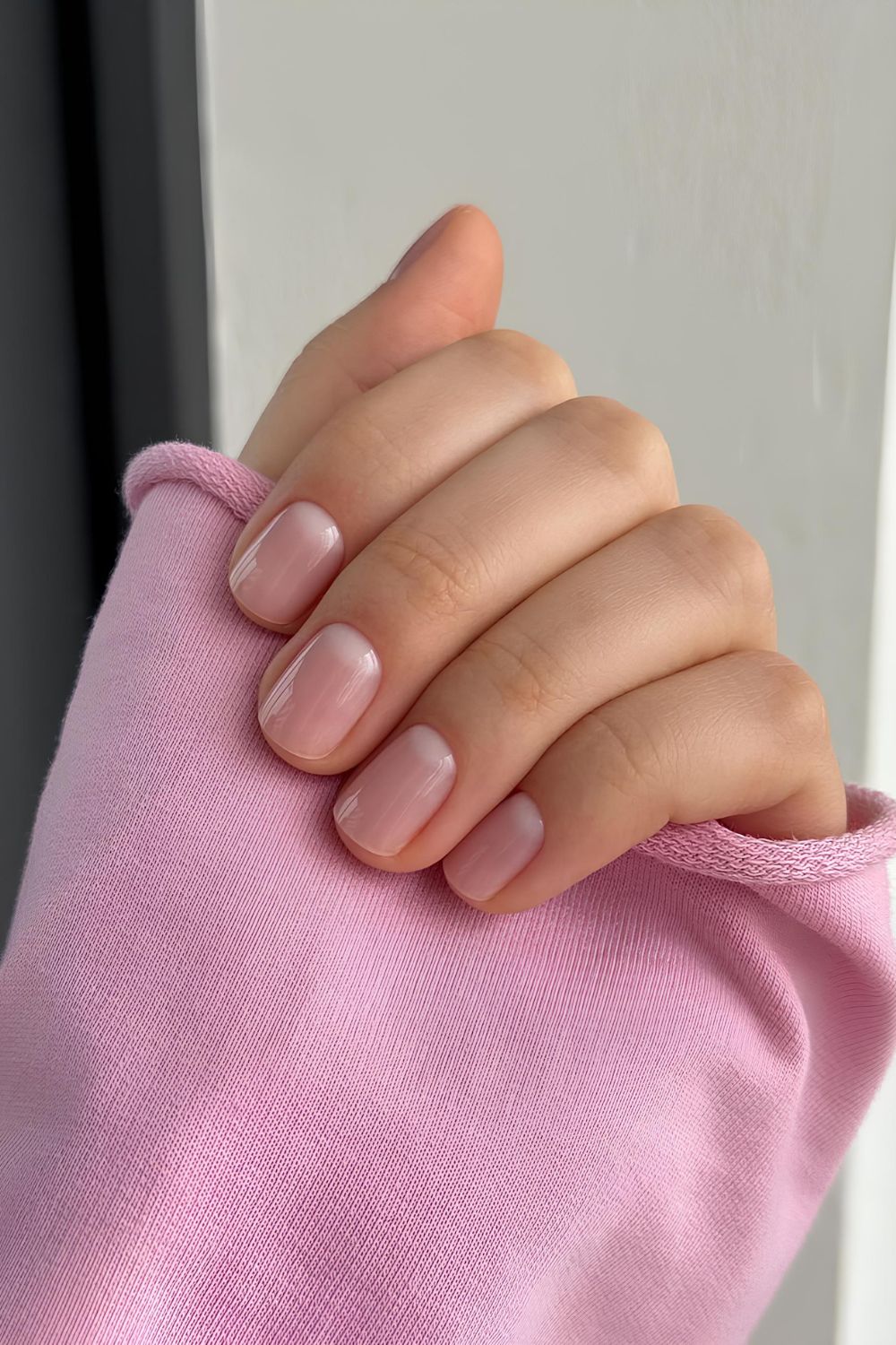 Soft pink nails with half moon accents