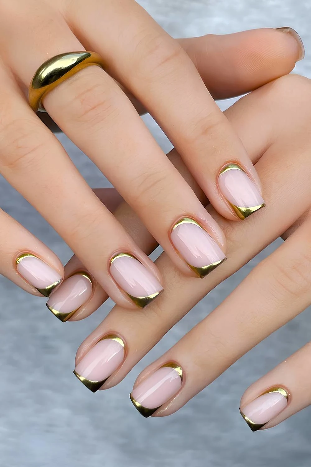 Upside down gold French manicure