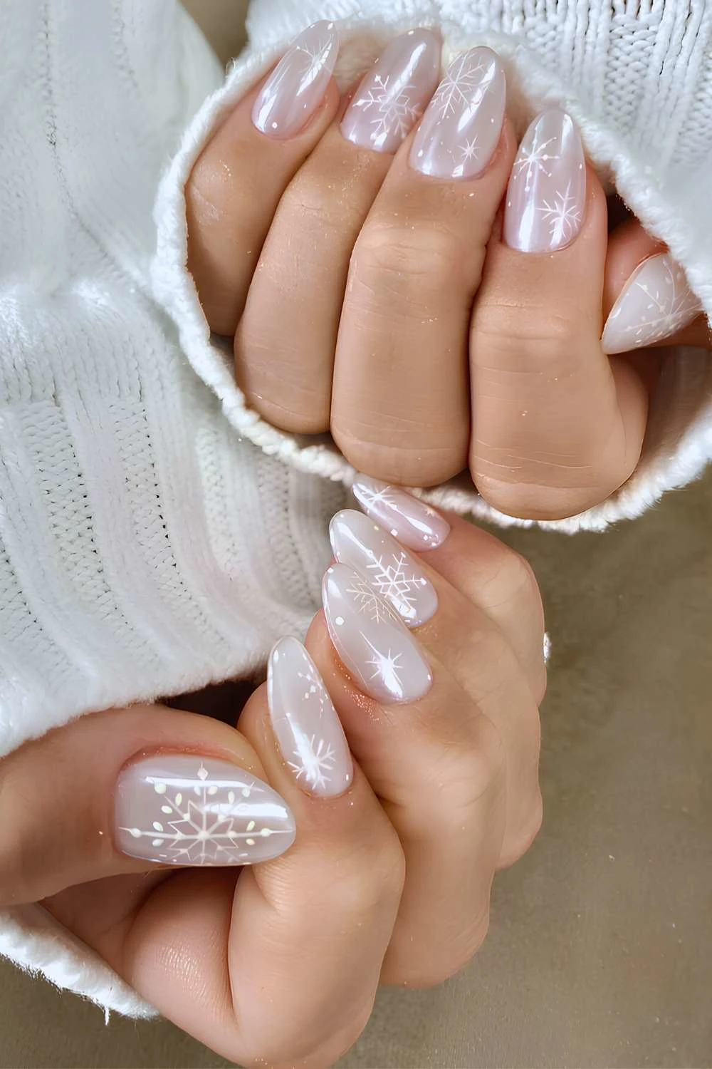 White chrome mani with snowflake art
