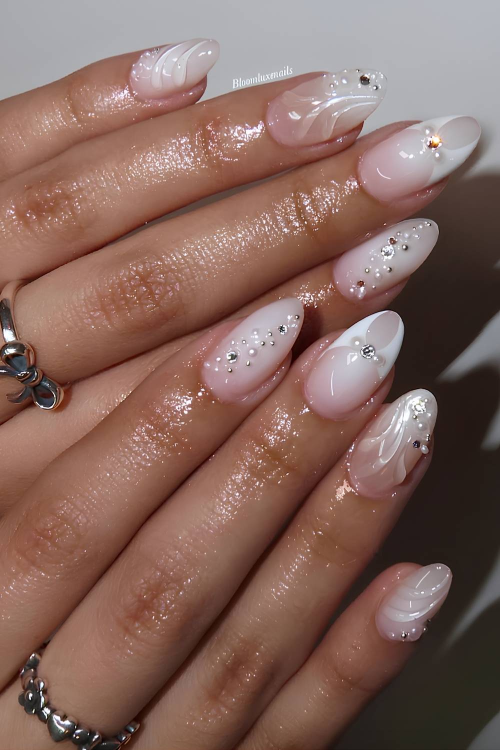 White nails with micro pearls and rhinestones