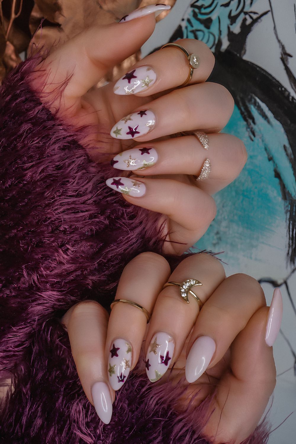 White nails with silver and purple stars