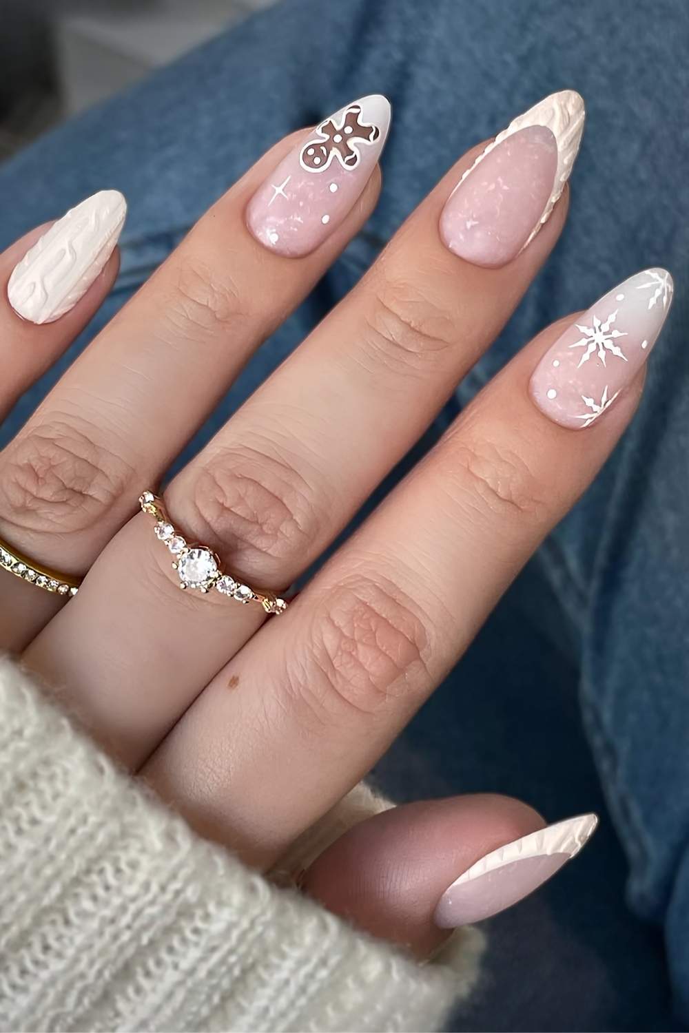 White nails with sweater pattern and gingerbread art
