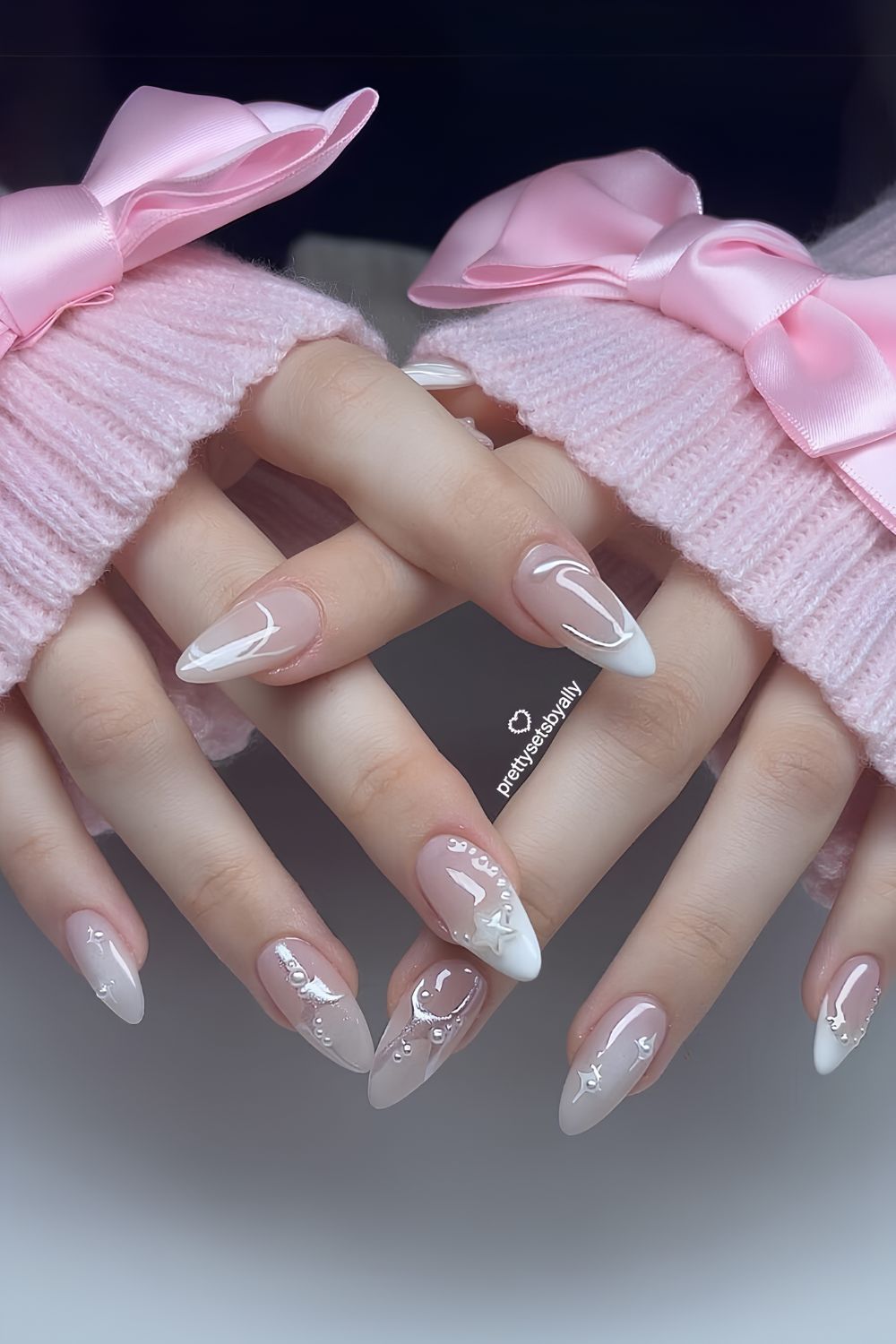 White ombre nails with 3D pearl accents