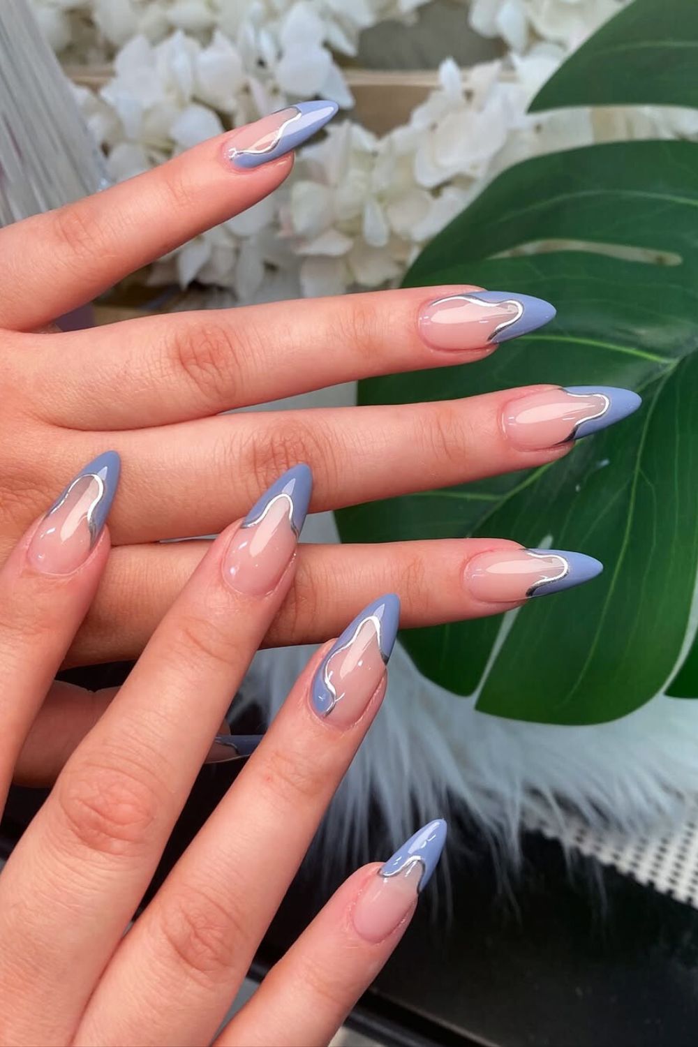 Abstract blue French tip nails with gold chrome lines