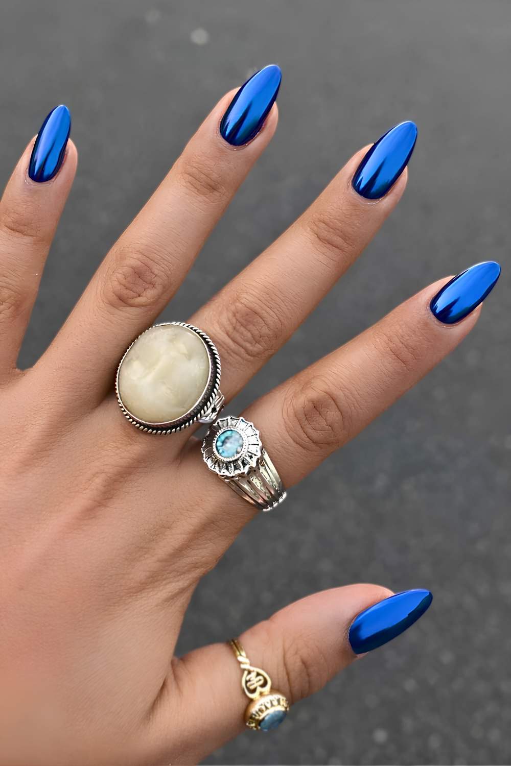 Almond sapphire blue chrome nails