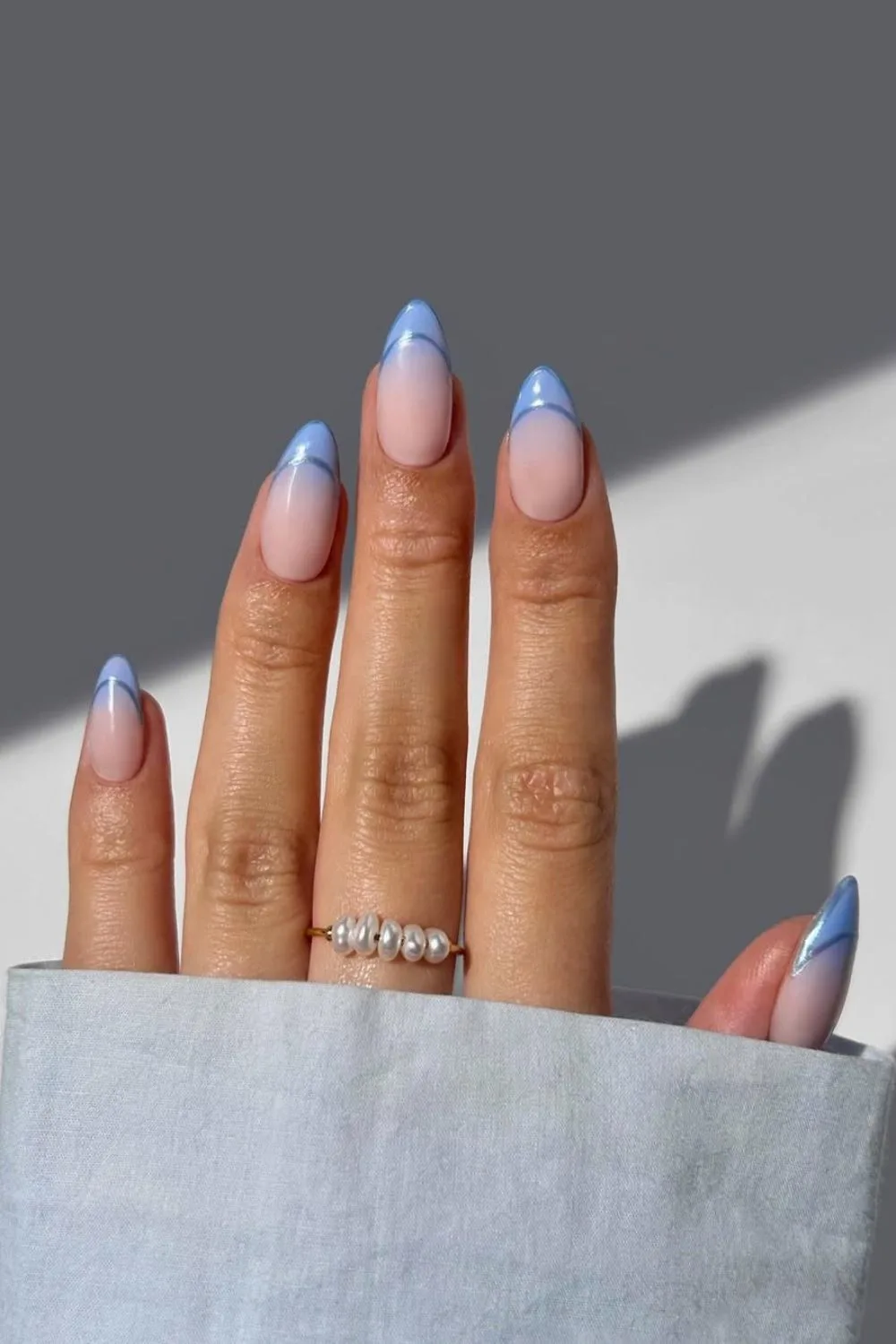 Baby blue ombre outlined French tip nails