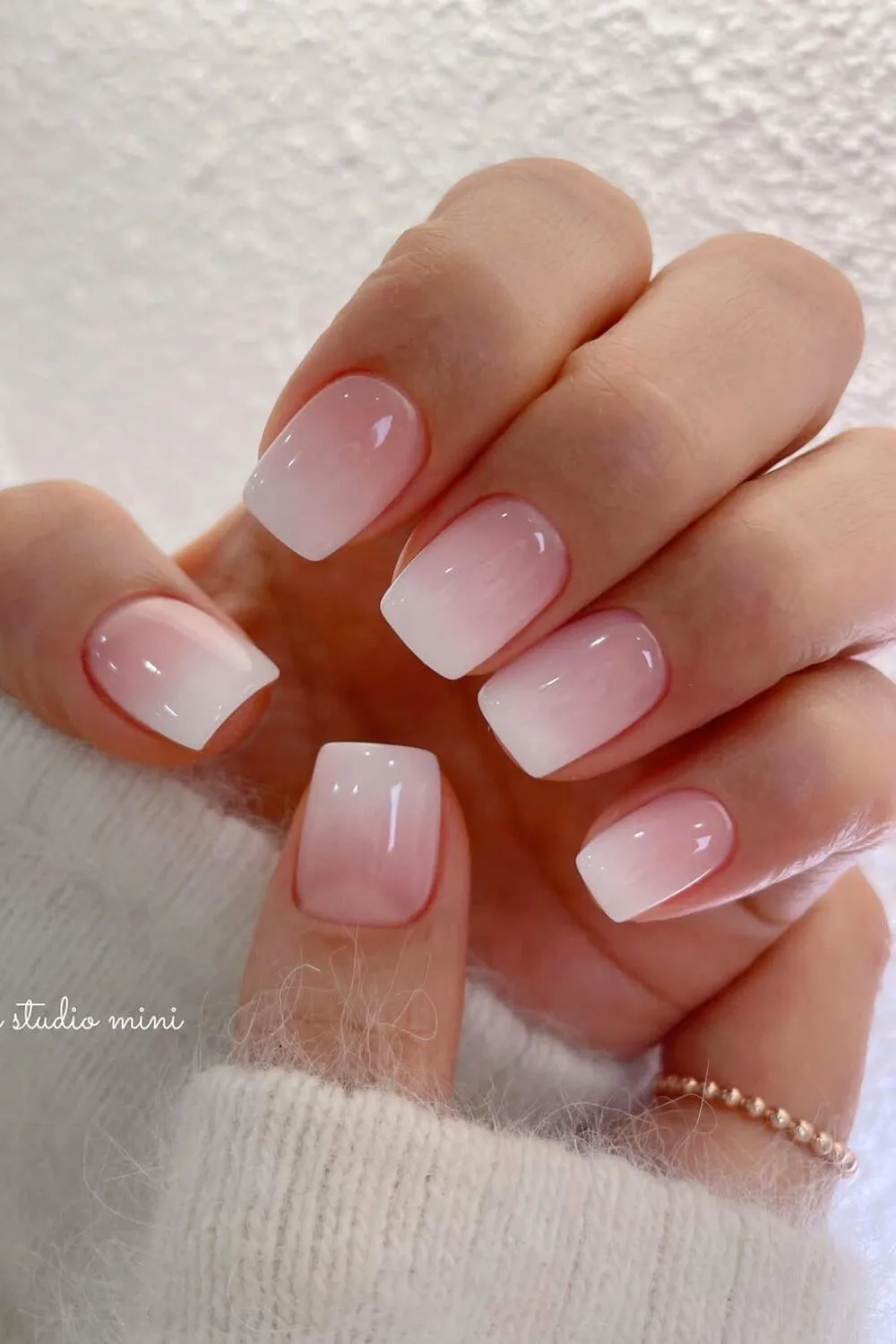 Baby boomer pink to white ombre nails