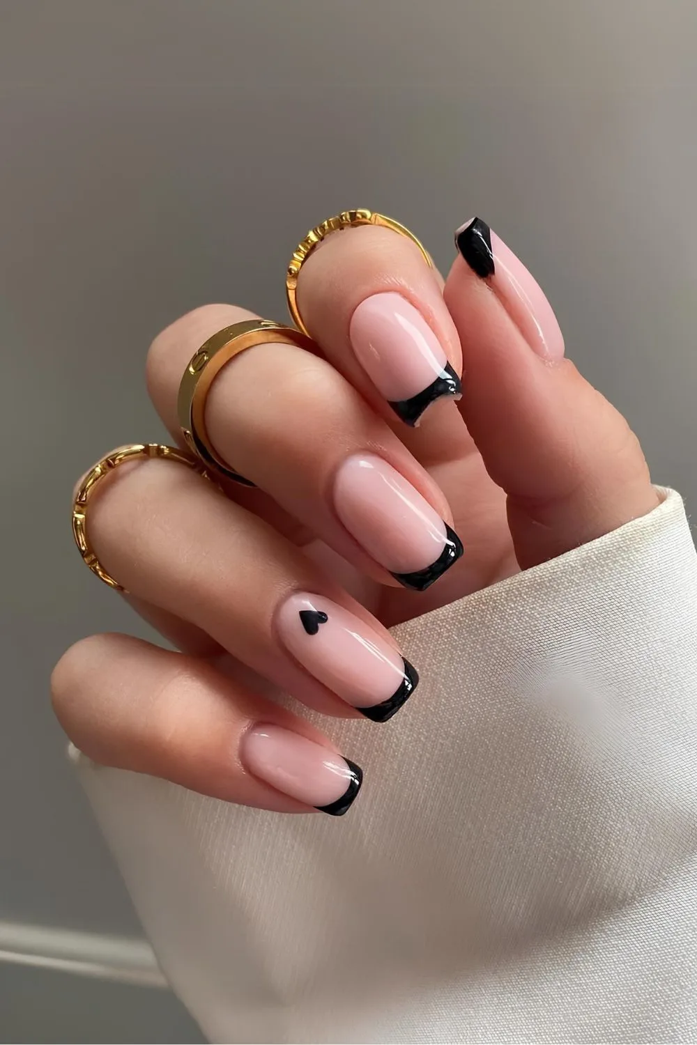 Black French nails with hearts