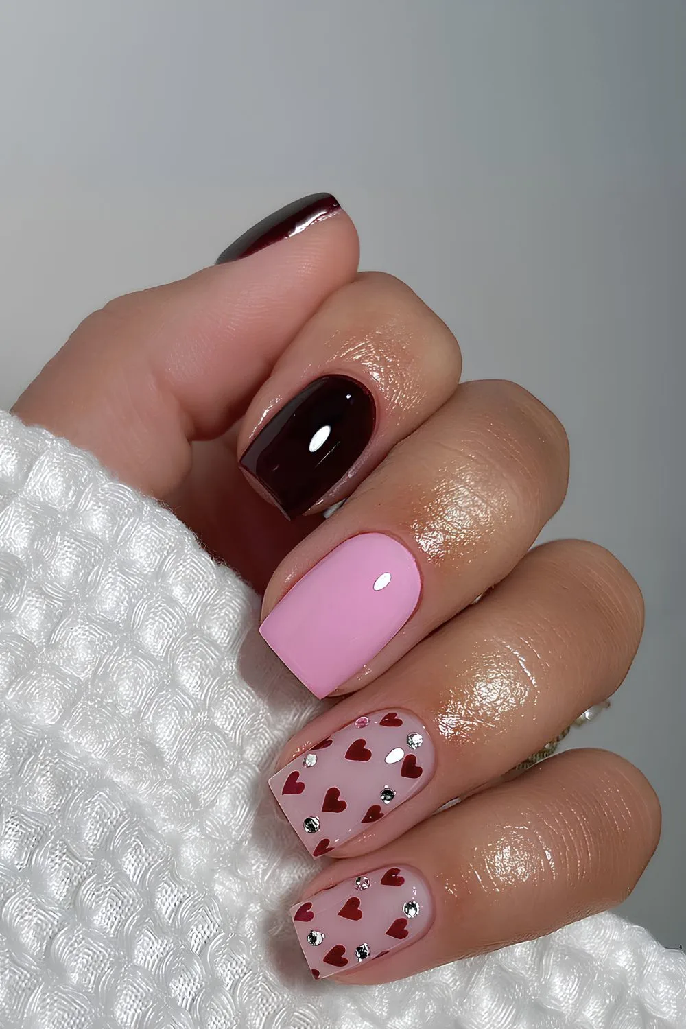 Black and pink nails with hearts