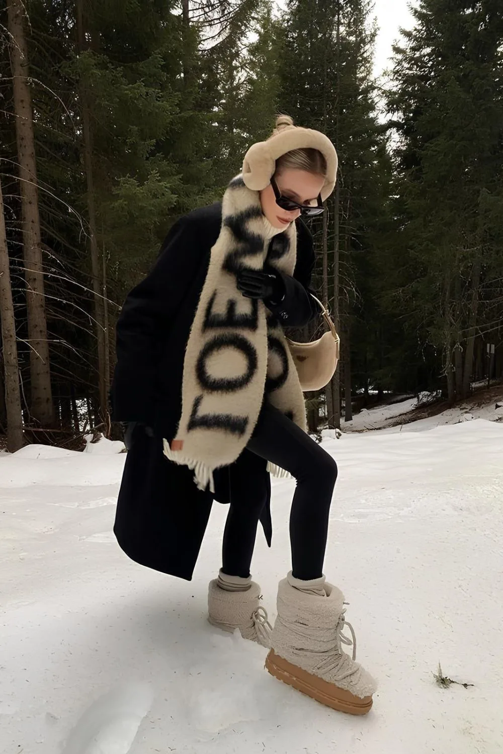 Black coat with monochrome giant scarf and snow boots