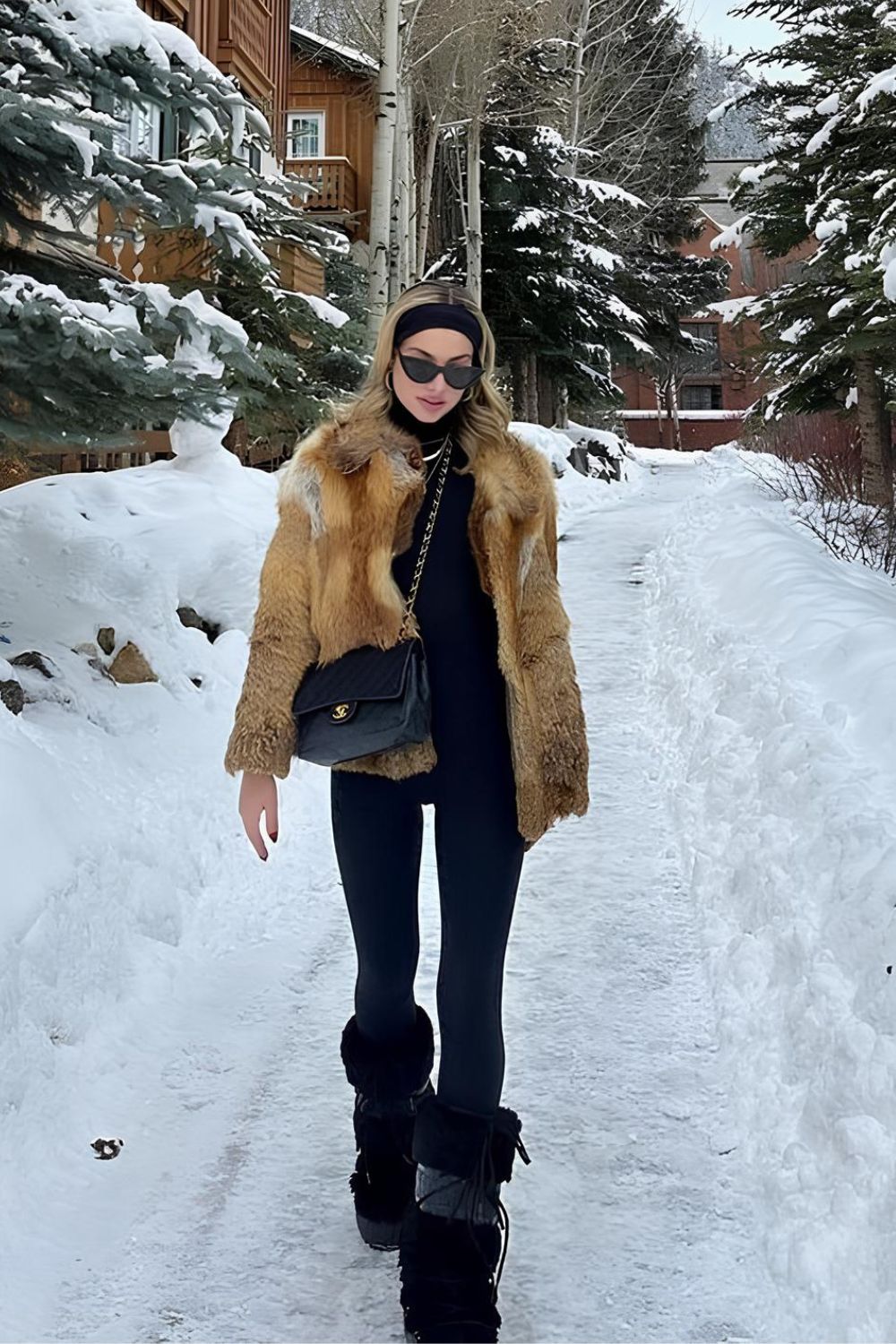 Black leggings and faux fur coat paired with black headband and boots