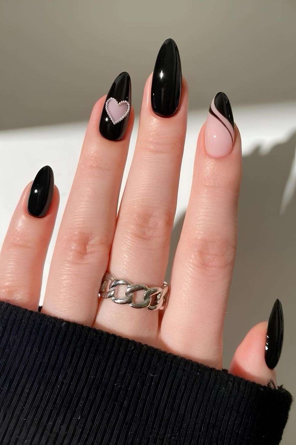 Black nails with diamond heart and swirls