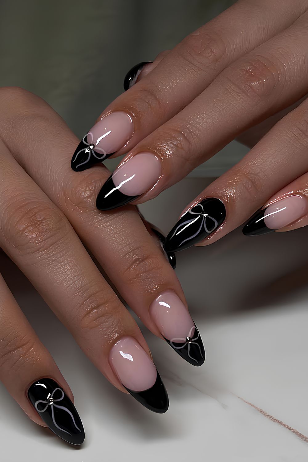 Black nails with white bow accents