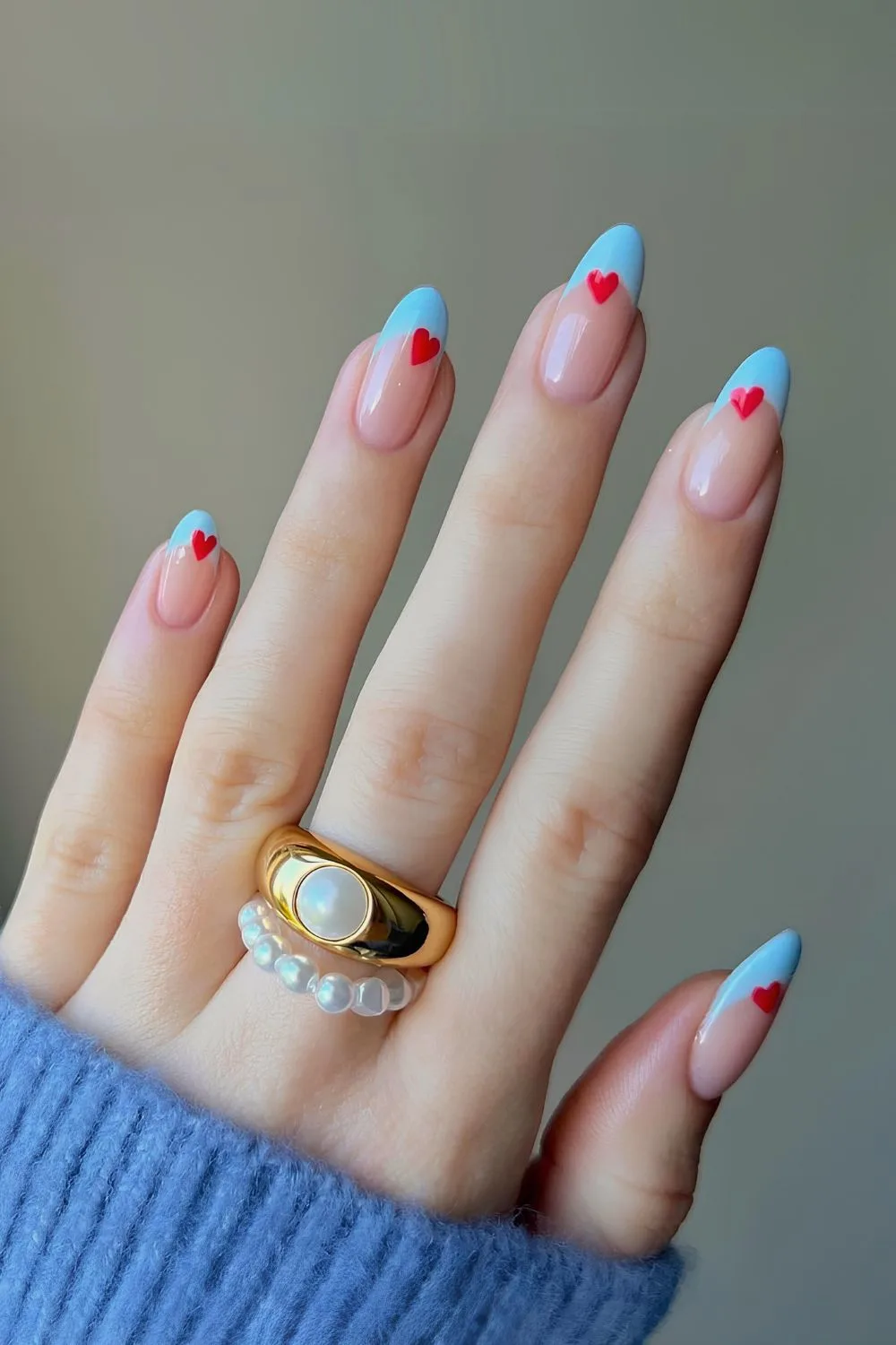 Blue French nails with red hearts