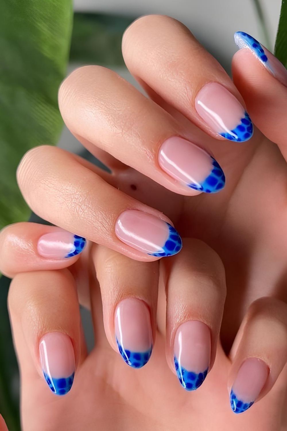 Blue croc print French tip nails