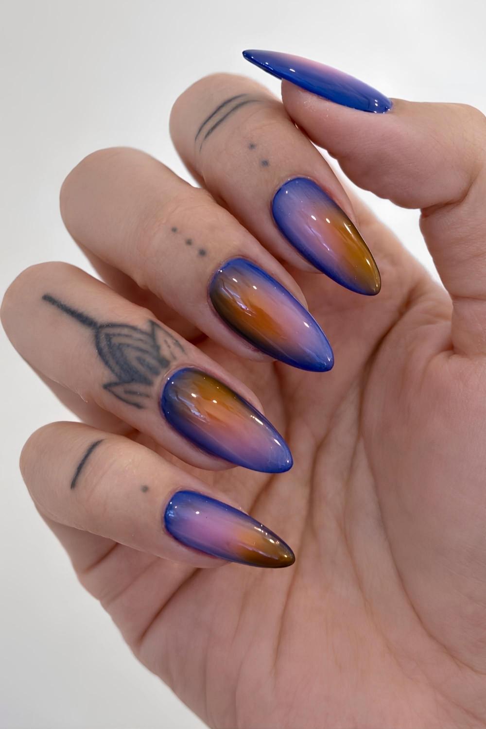 Blue mani with pink and orange aura