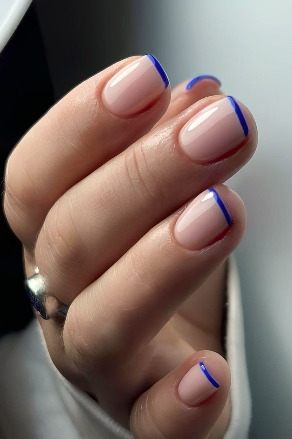 Blue micro French tip nails