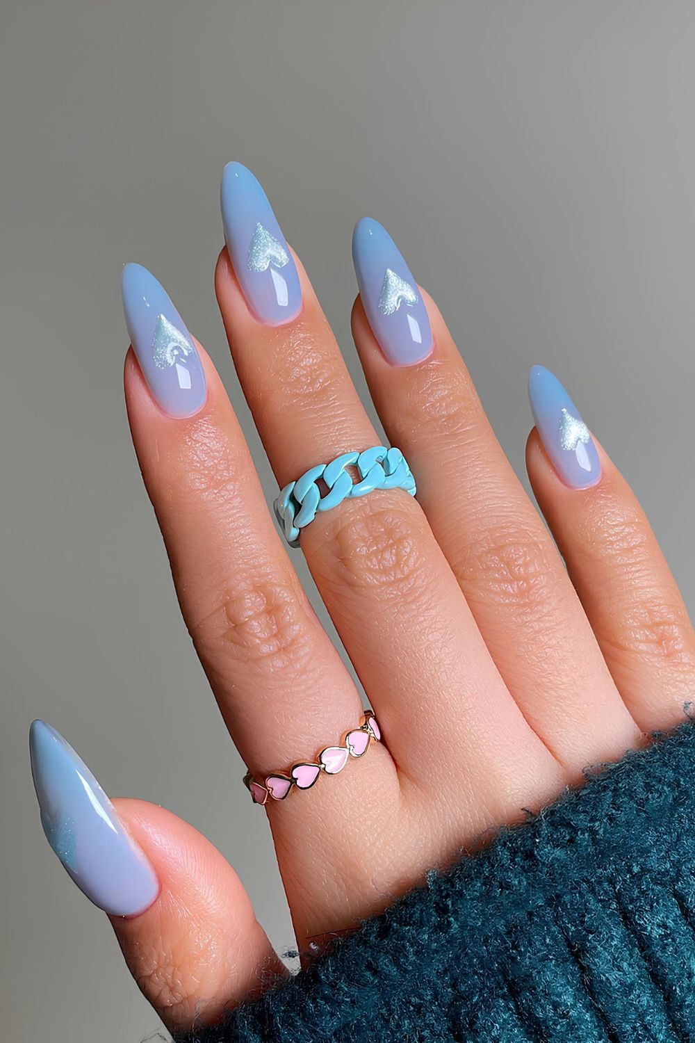 Blue nails with puffy heart accents