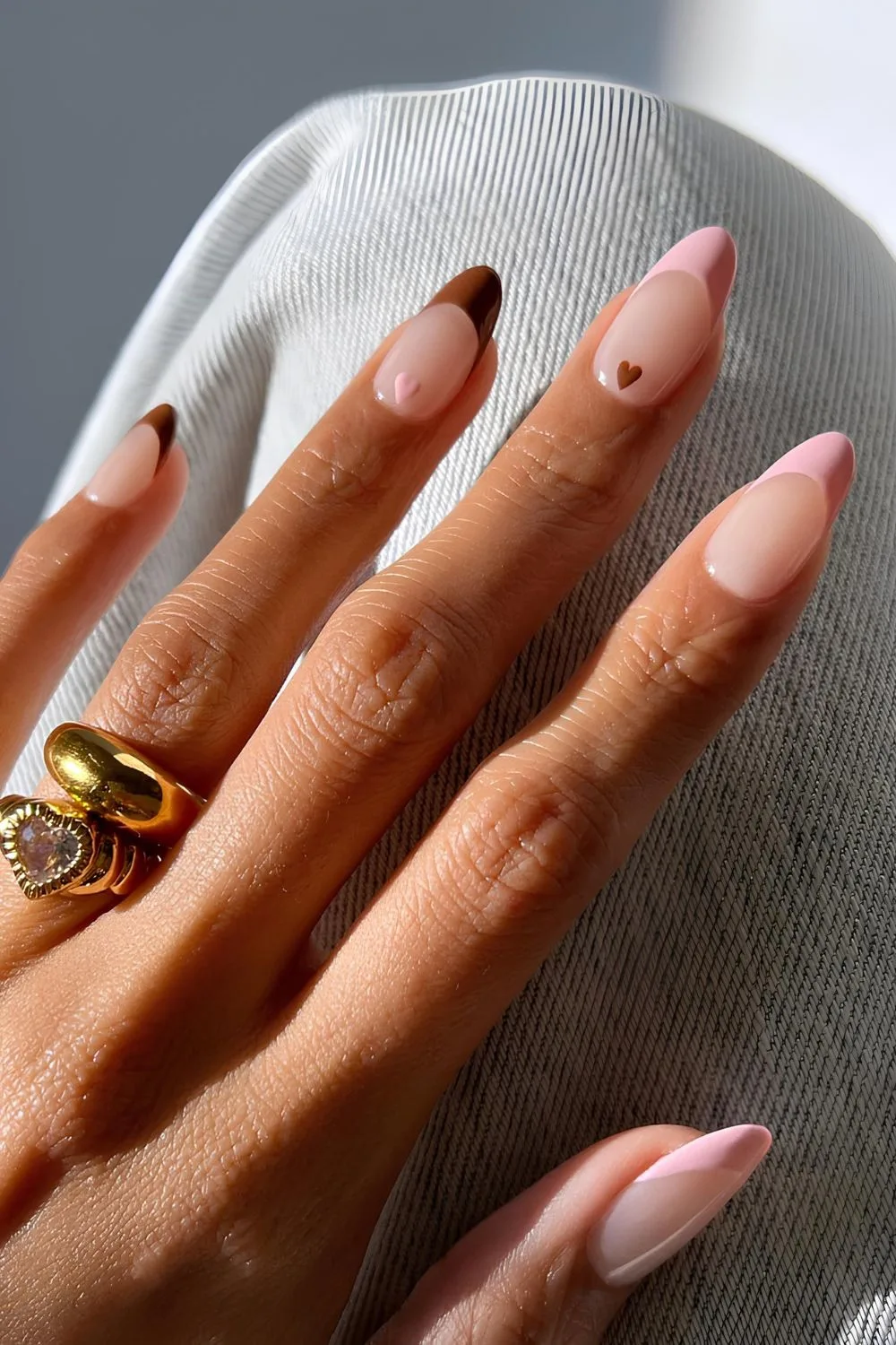 Brown and pink French nails with hearts