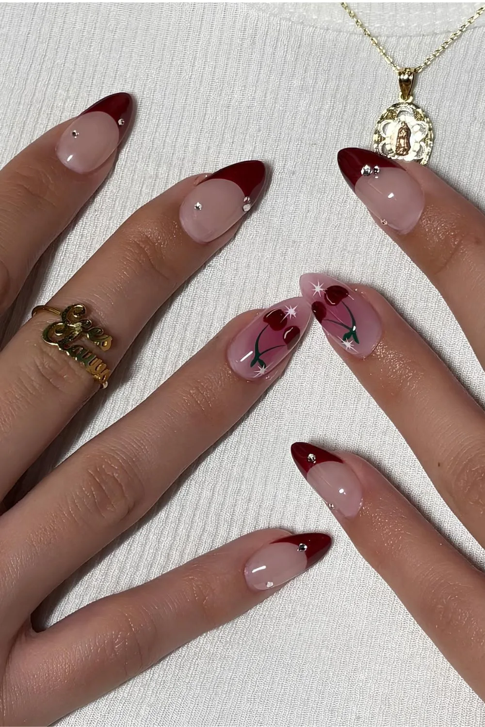 Burgundy French nails with gems and cherries