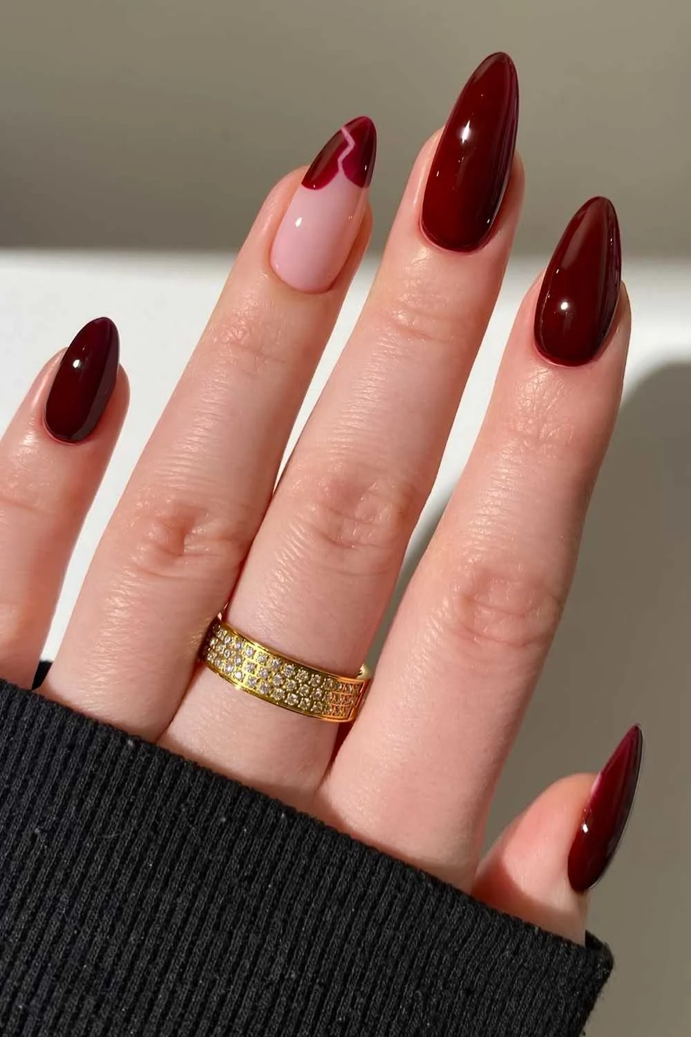 Burgundy mani with broken heart art