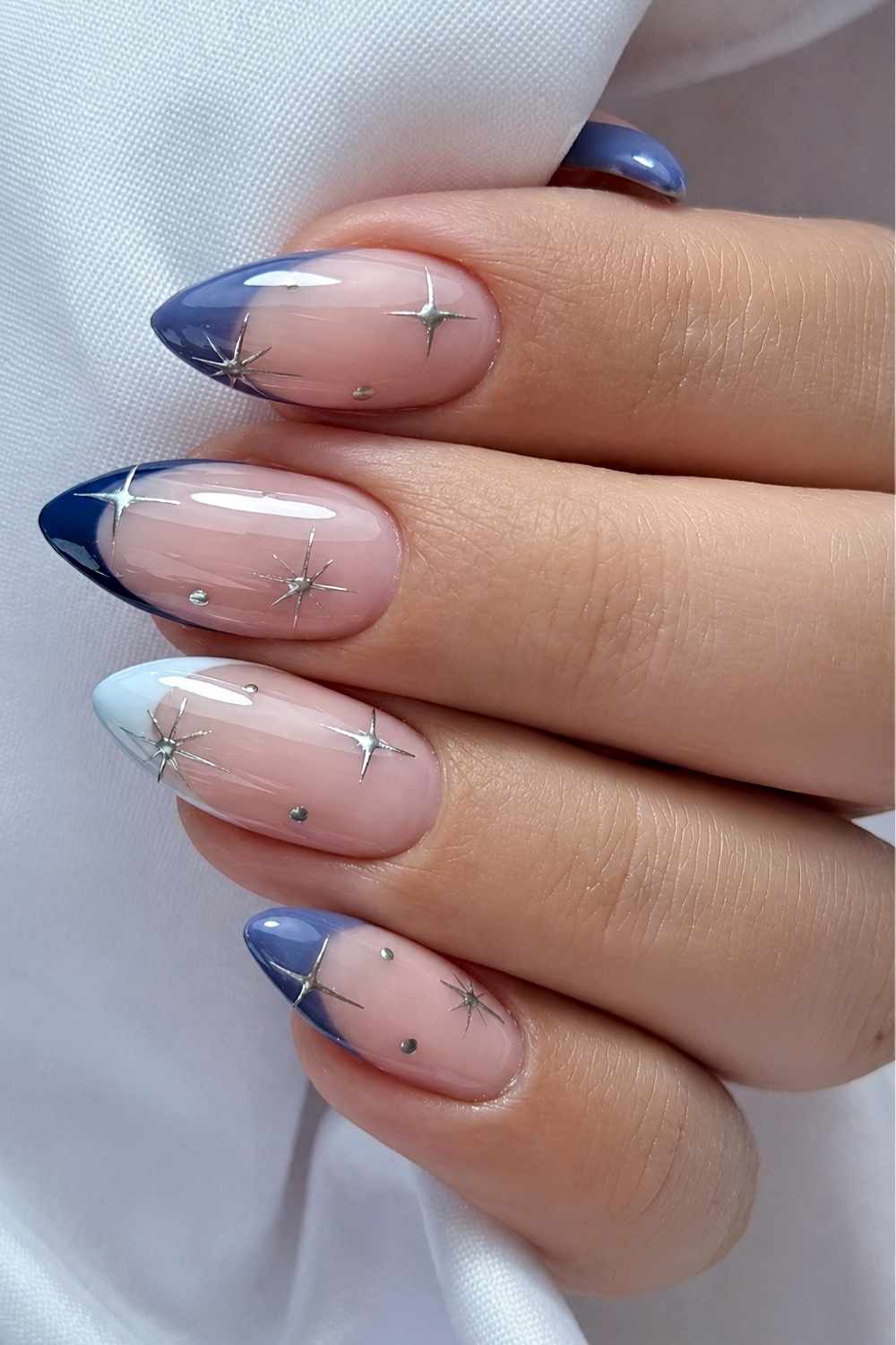 Celestial French mani in different blue tones