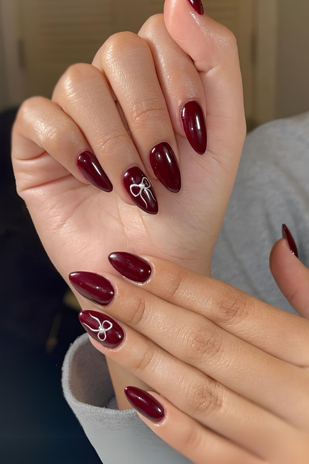 Cherry mocha manicure with bows