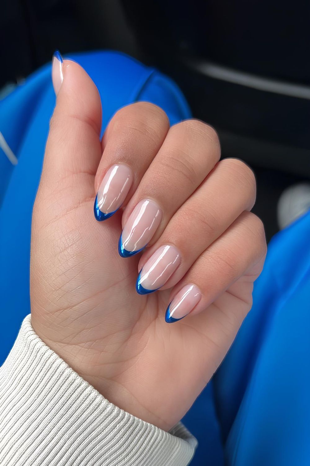 Chrome blue French tip nails with glazed finish