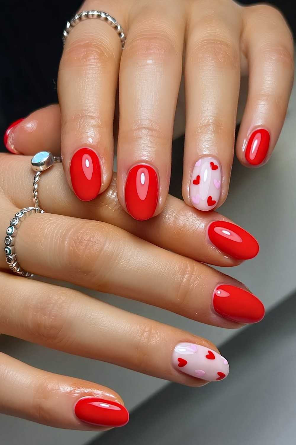 Classic red mani with pink and red hearts