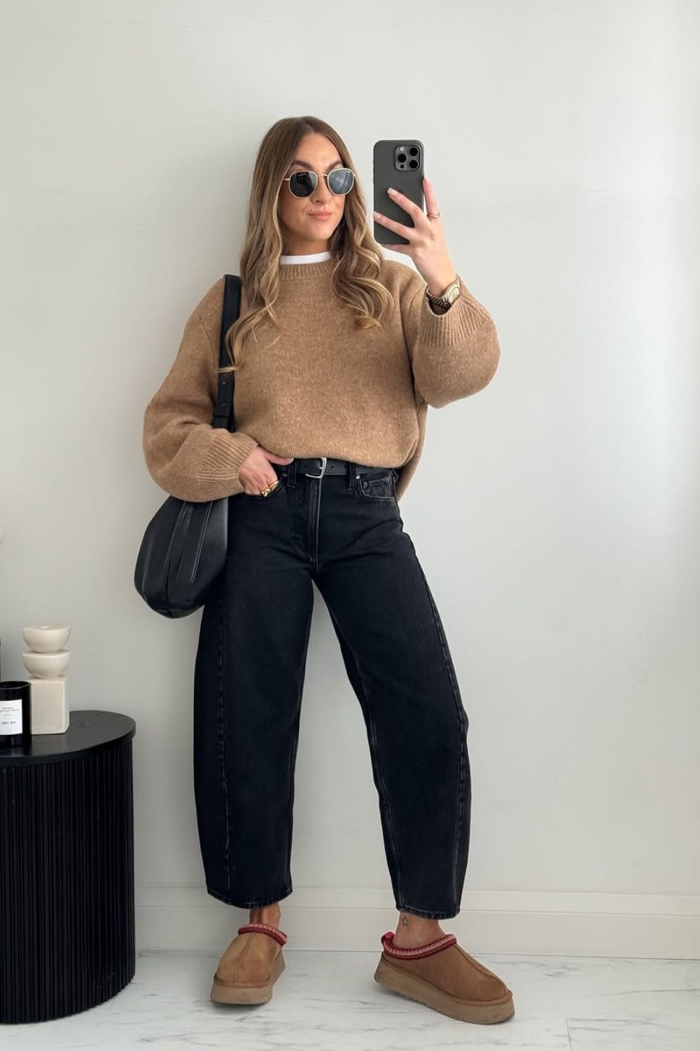 Dark barrel jeans and camel brown sweater