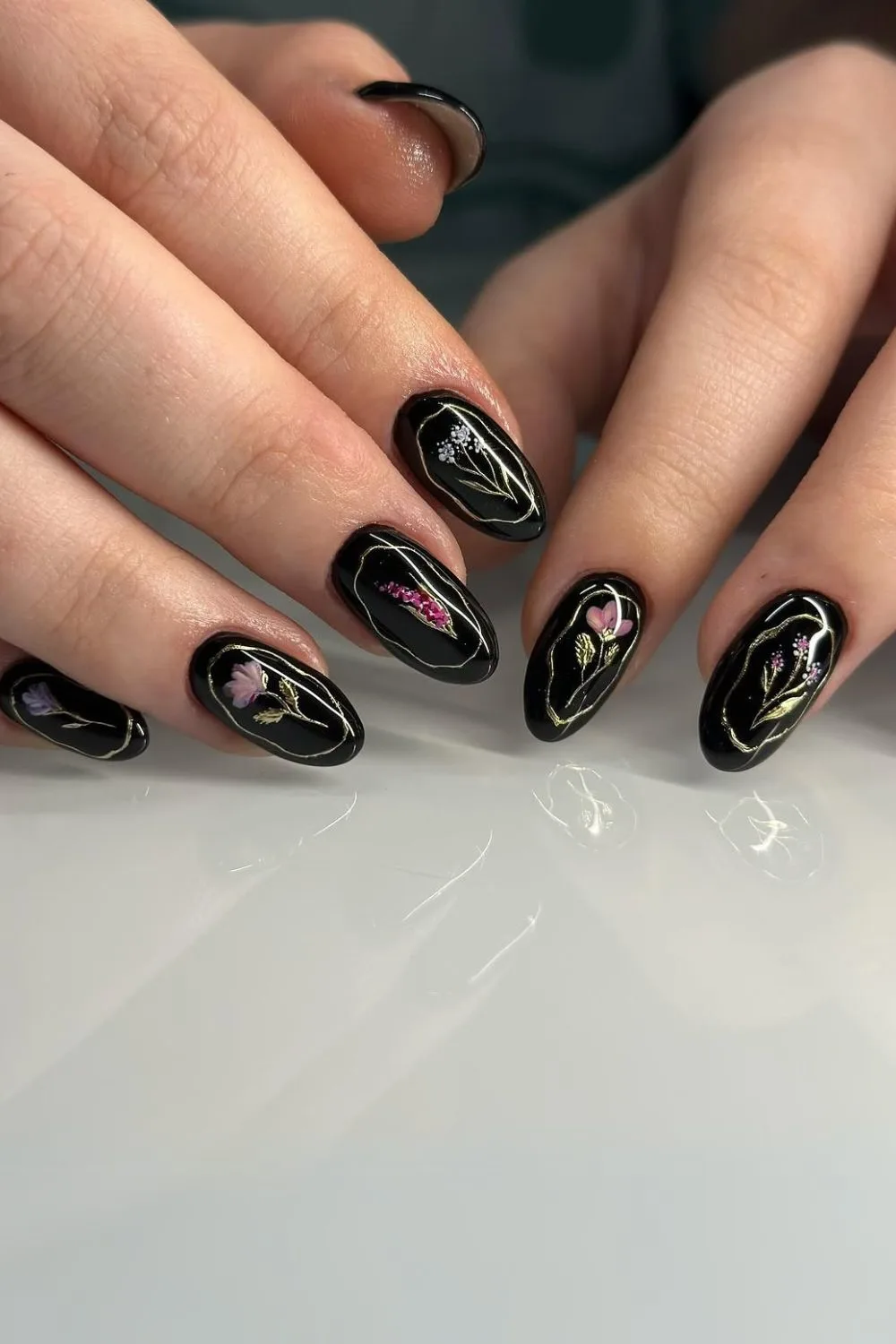 Dark floral nails and isolated chrome