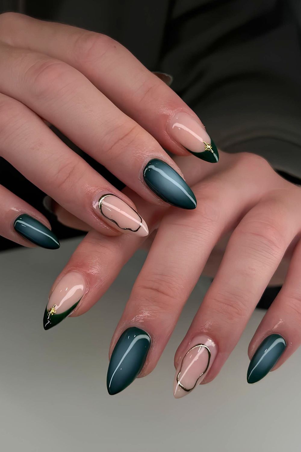 Dark green aura nails with gold accents