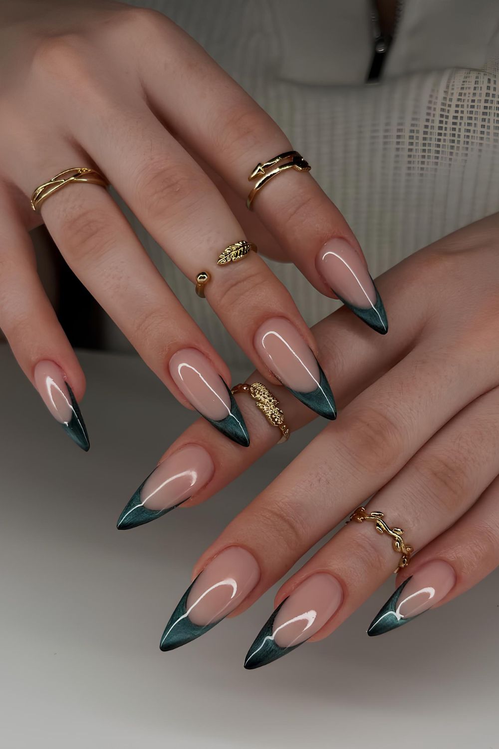 Dark green cat-eye French nails