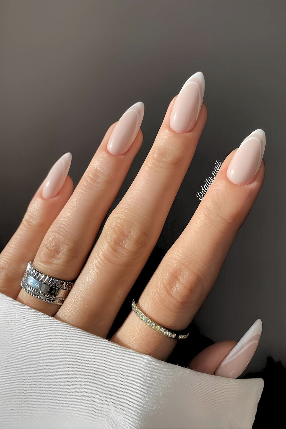 Double white French tips on a milky base