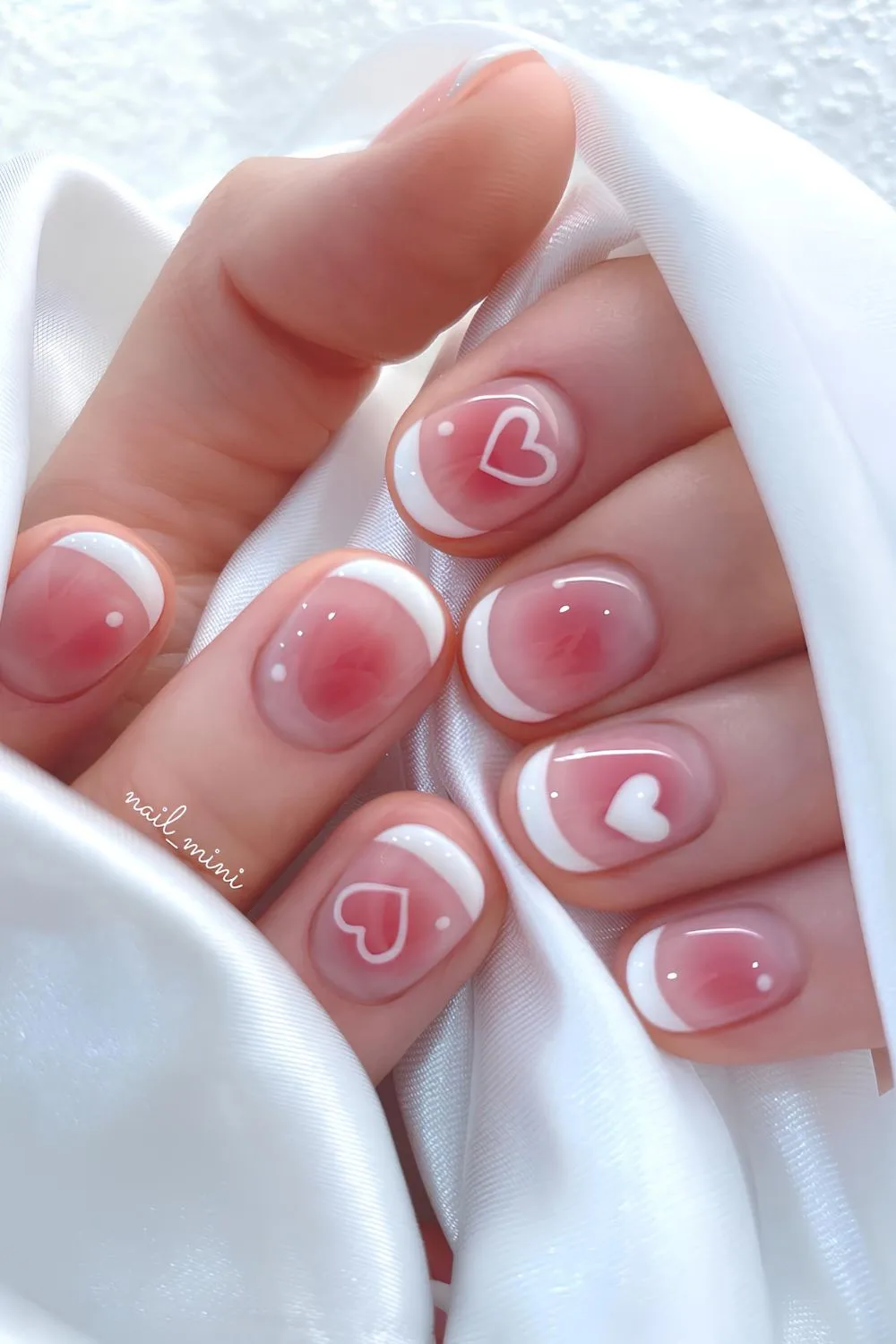 French nails with aura effect and heart accents