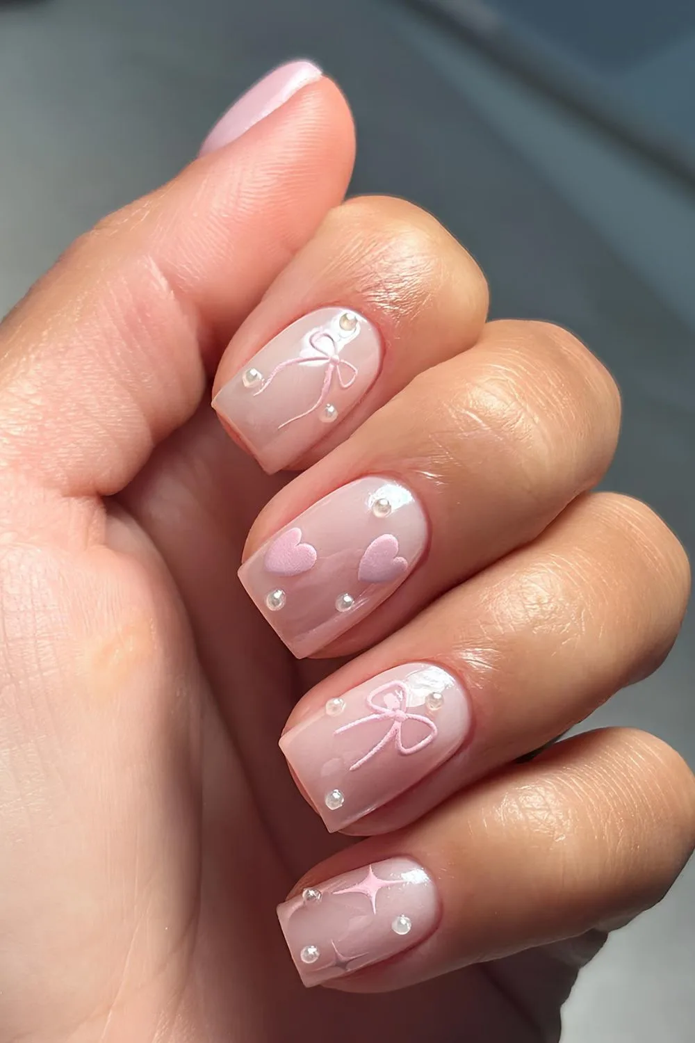 Galzed soft pink nails with hearts and bows