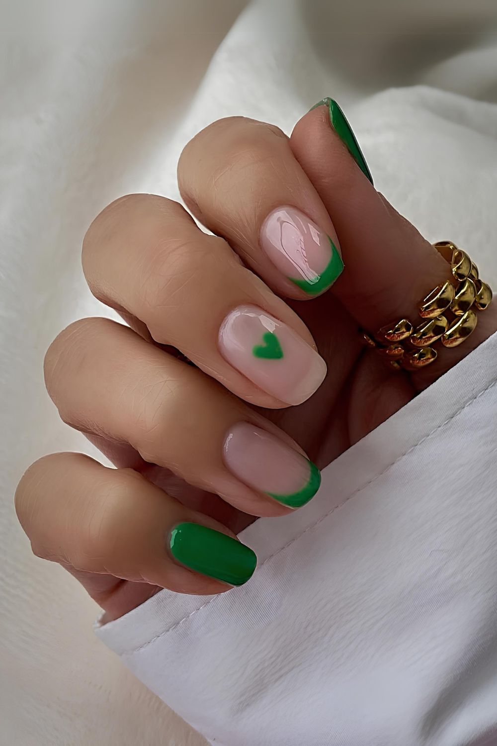 Green French nails with hearts