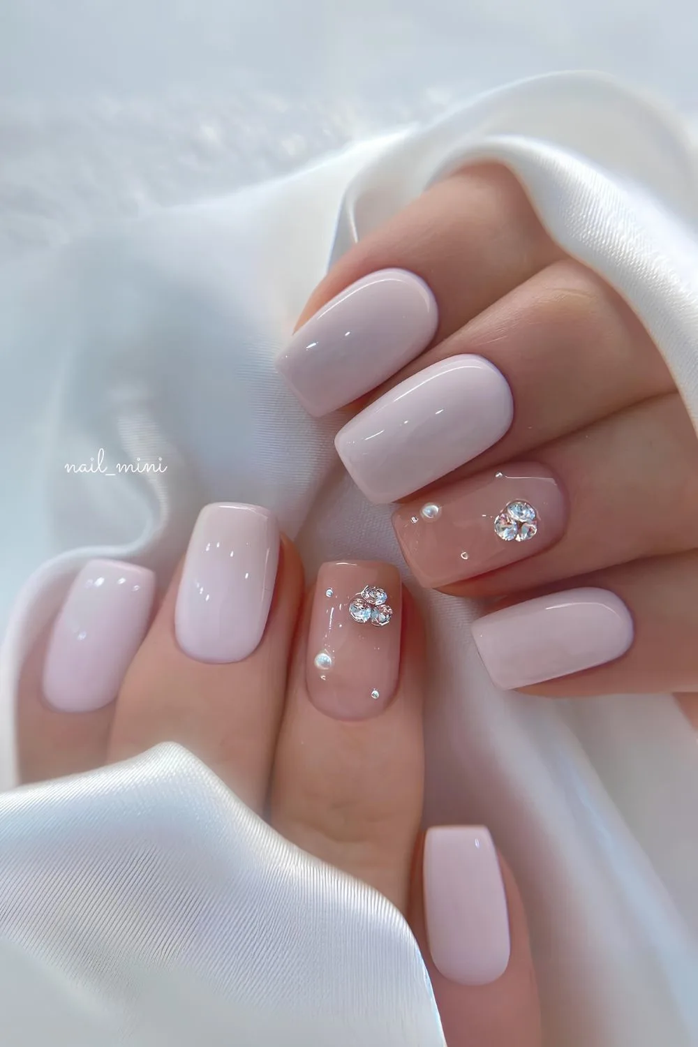 Icy pink nails with rhinestones