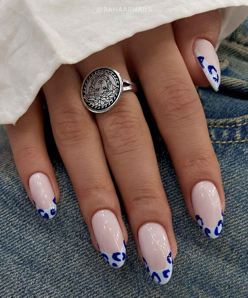 Light blue French mani with leopard print