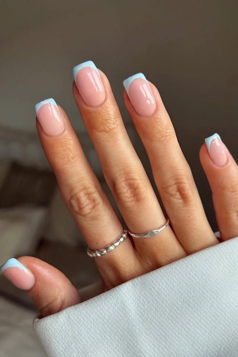 Light blue French tip nails