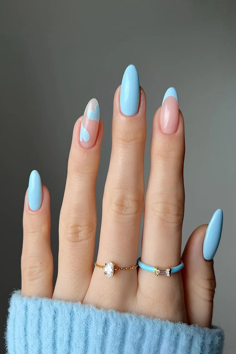 Light blue Valentine nails with hearts