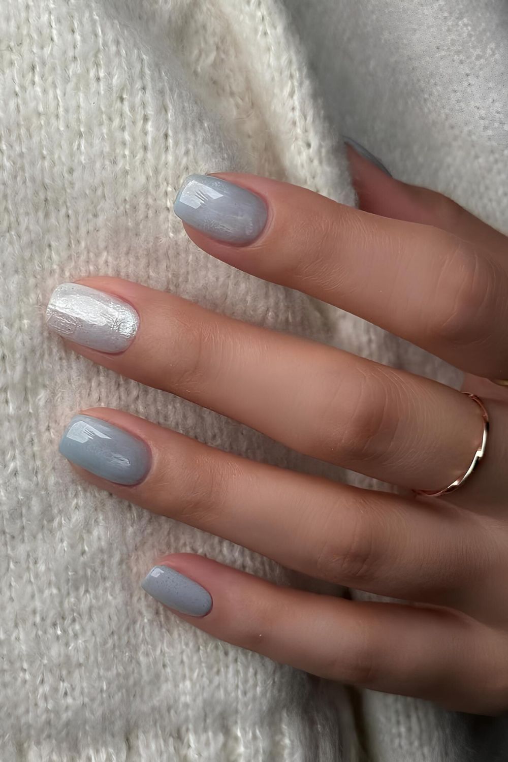 Light blue mani with silver accent nail