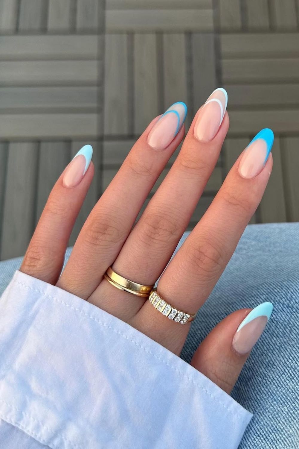 Light blue outlined French tip nails